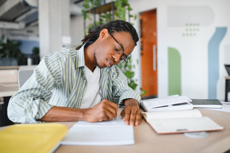 Student writing an academic paper in LA